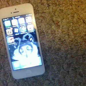 iphone 5 like new minor crack on screen.
